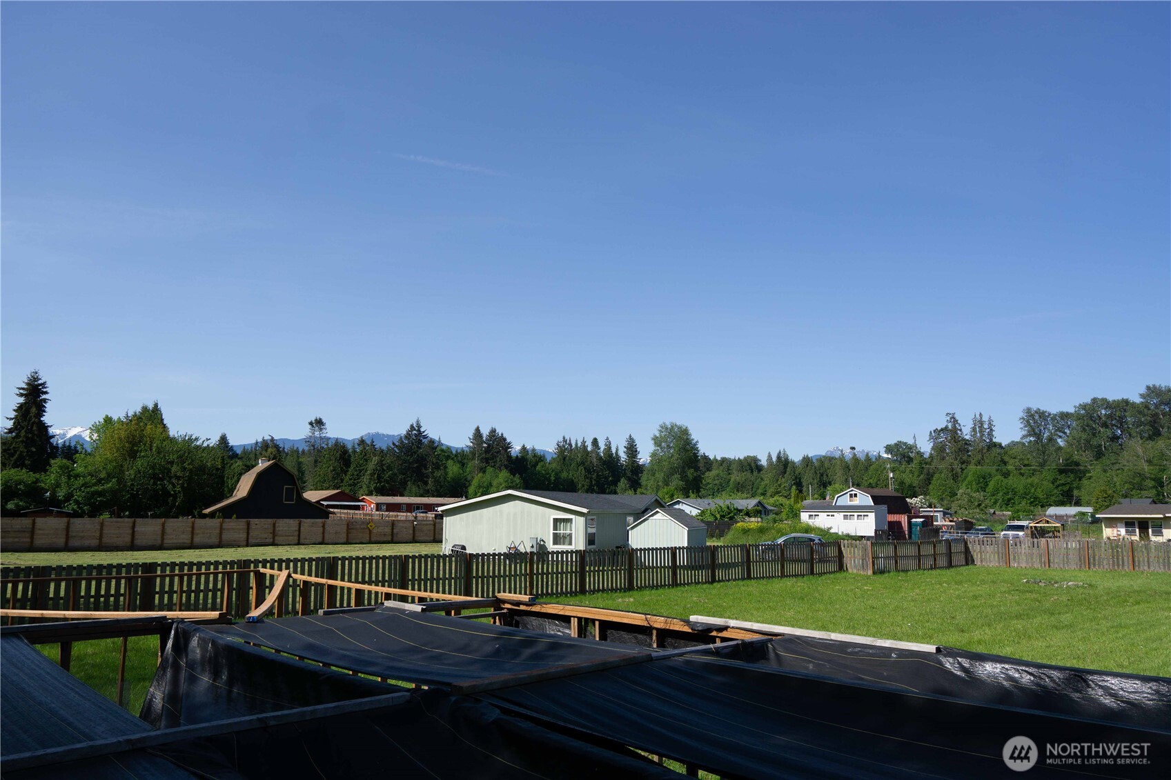 2 Community Lane Sequim, WA 98382 - Photo 15 of 33 a view of house with outdoor space and seating