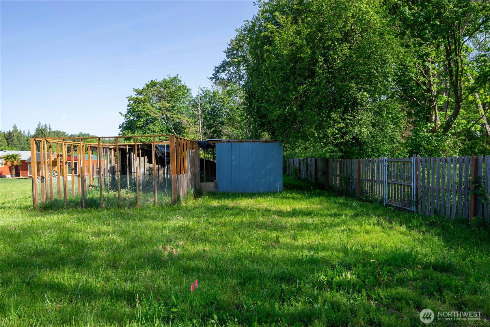2 Community Lane Sequim, WA 98382 - Photo 19 of 33 a backyard of a house with lots of green space