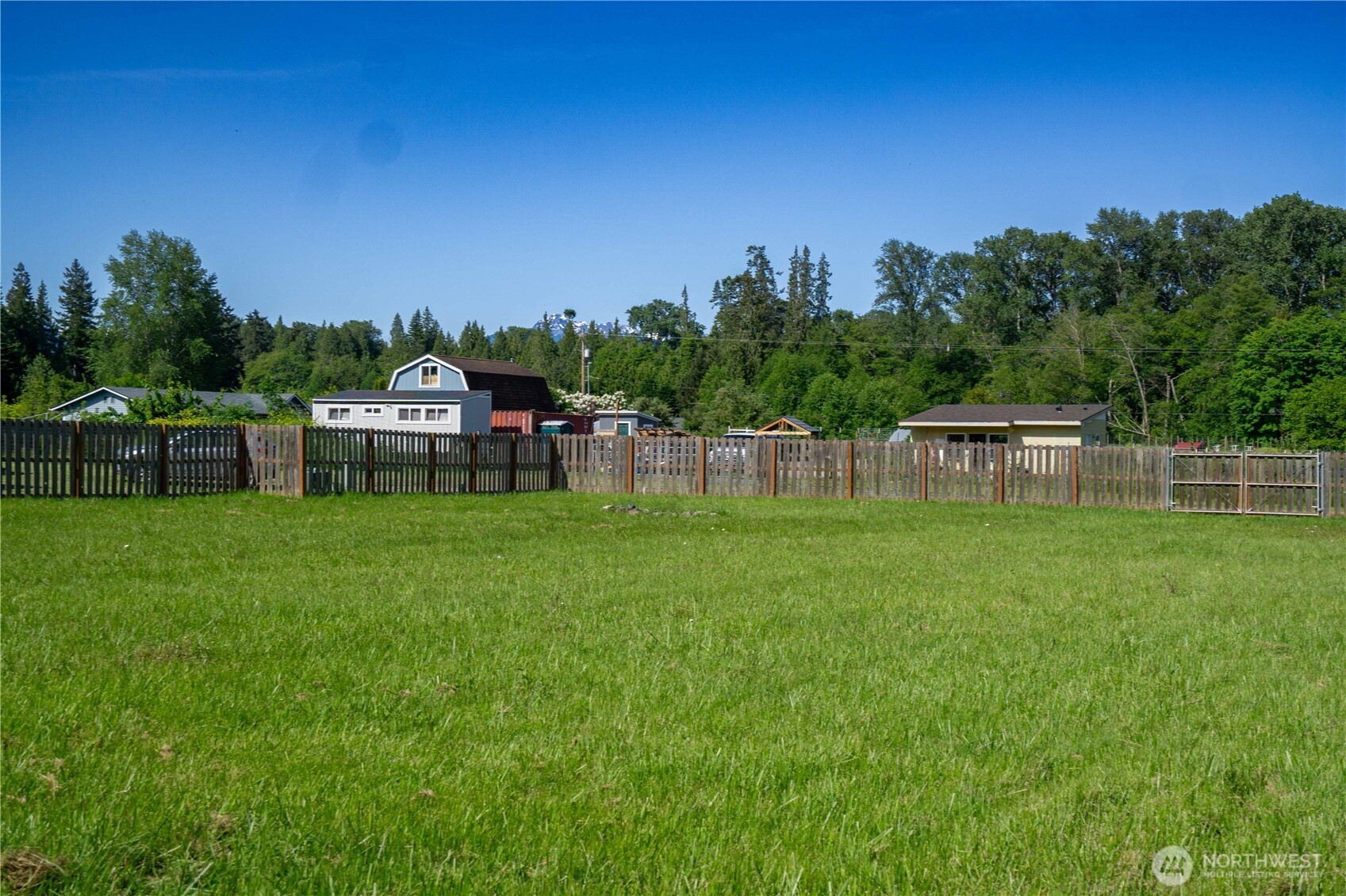2 Community Lane Sequim, WA 98382 - Photo 28 of 33 a view of a house with backyard and a backyard
