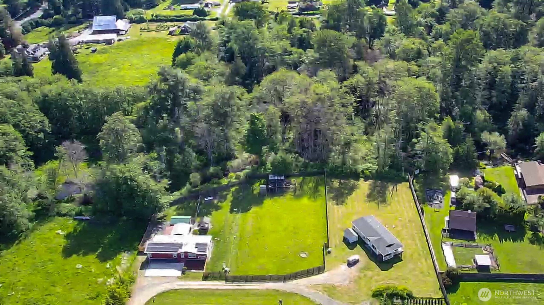2 Community Lane Sequim, WA 98382 - Photo 3 of 33 an aerial view of a swimming pool with yard