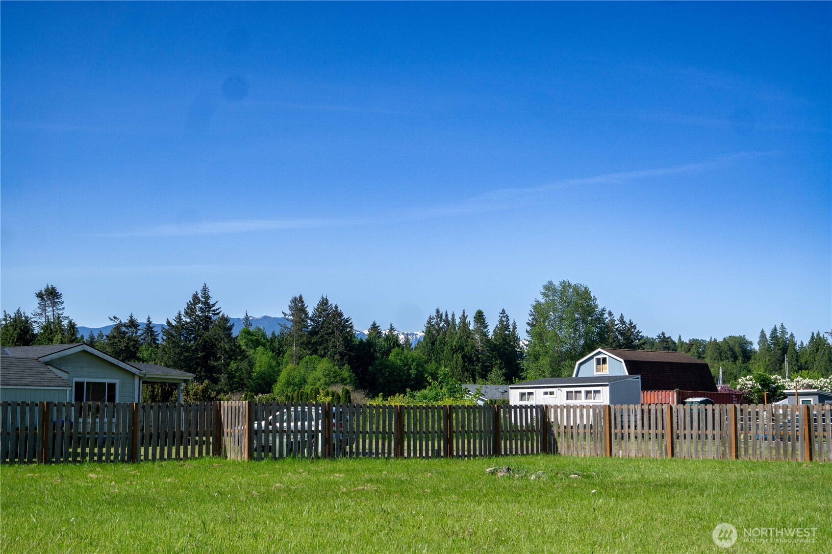 2 Community Lane Sequim, WA 98382 - Photo 8 of 33 a view of a house with backyard and a garden