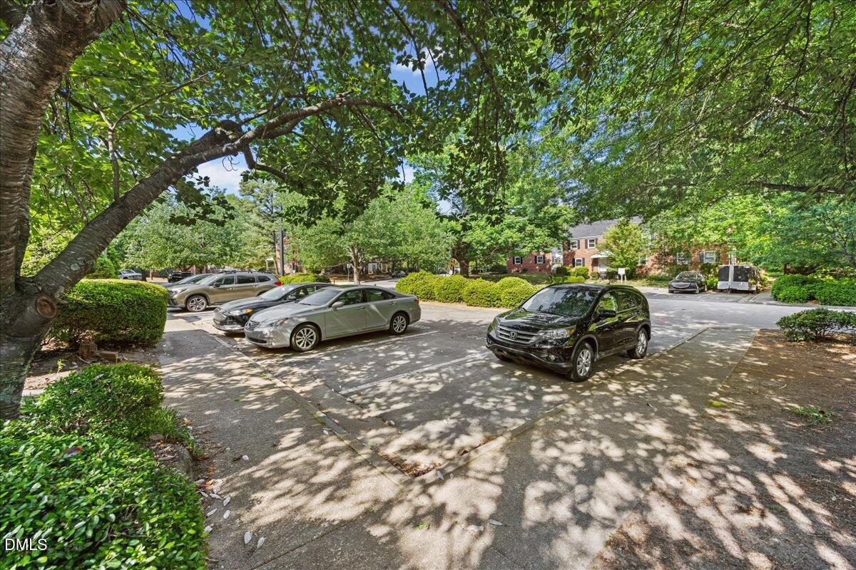 1627 Sutton Drive Raleigh, NC 27605 - Photo 23 of 33 a view of a backyard with sitting area