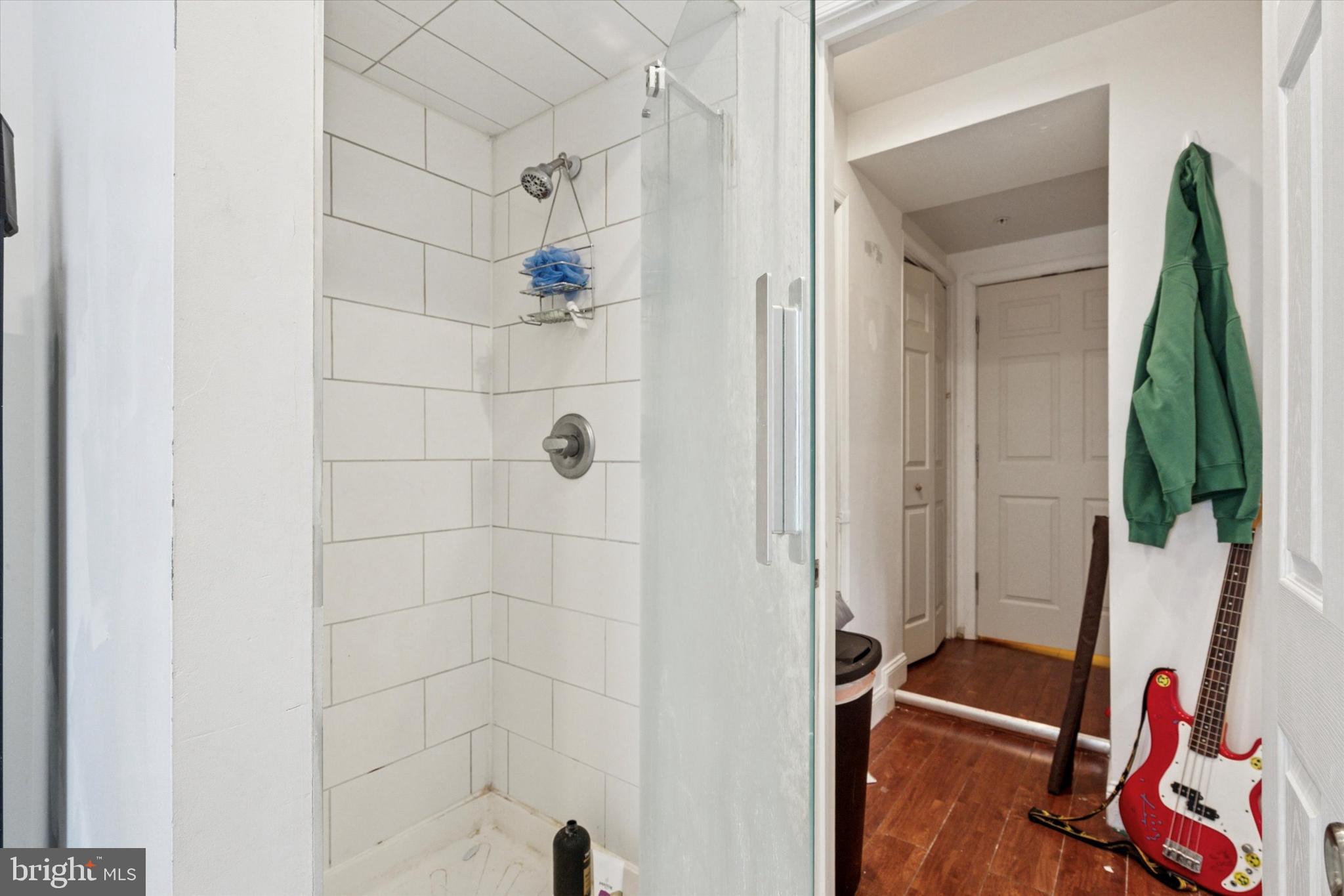 517 North 35th Street Philadelphia, PA 19104 - Photo 22 of 24 a bathroom with a bathtub and a shower