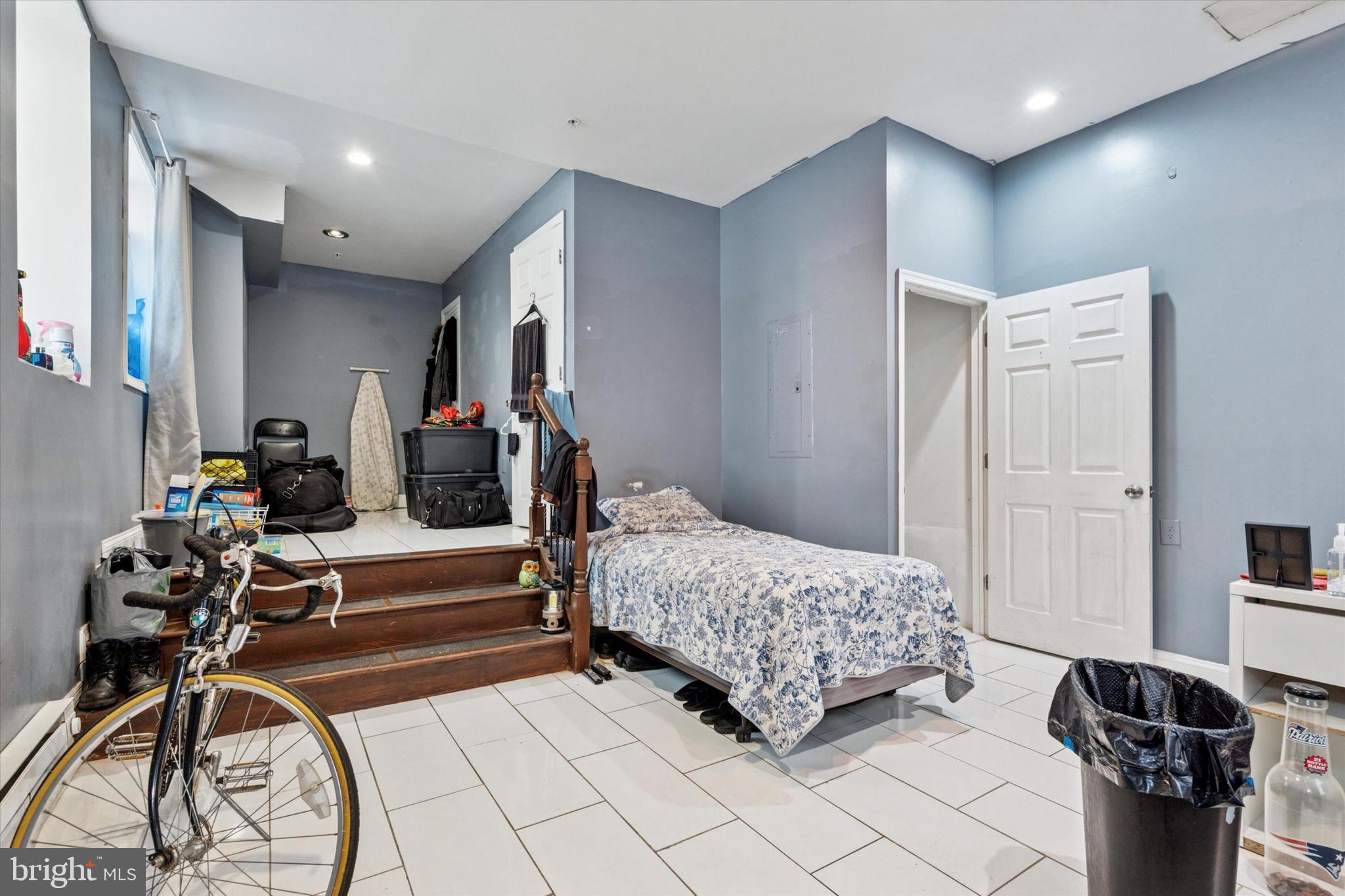 517 North 35th Street Philadelphia, PA 19104 - Photo 4 of 24 a bedroom with furniture and a mirror
