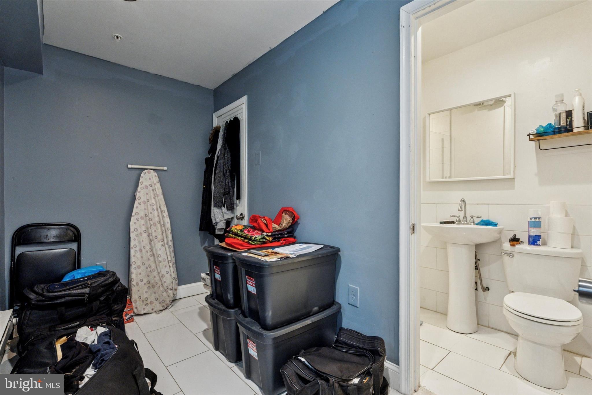 517 North 35th Street Philadelphia, PA 19104 - Photo 7 of 24 a living room with furniture and a wooden floor