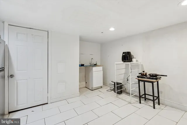 a view of a kitchen with appliances