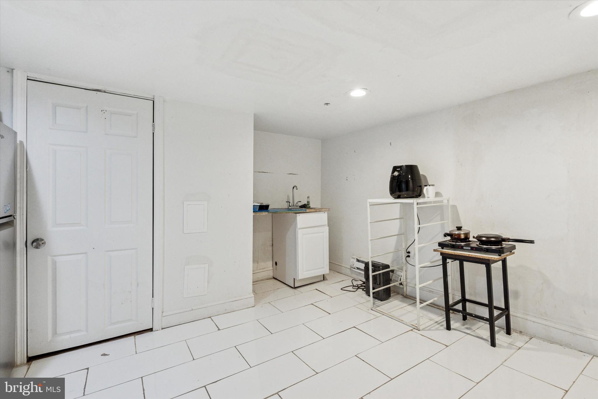 517 North 35th Street Philadelphia, PA 19104 - Photo 9 of 24 a view of a kitchen with appliances