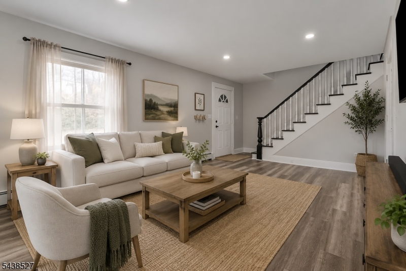 83 Highway 15 Lafayette, NJ 07848 - Photo 1 of 20 a living room with furniture and a table