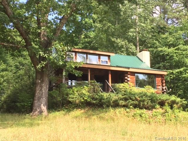 833 Hidden Valley Road Clyde, NC 28721 - Photo 12 of 14 a front view of a house with a yard