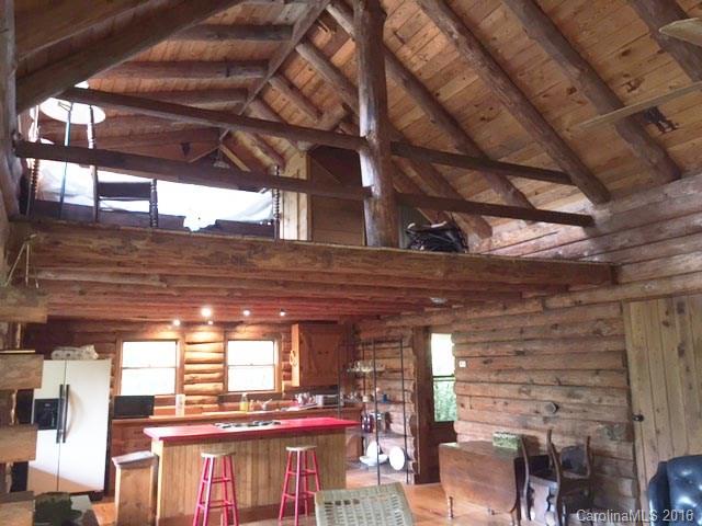 833 Hidden Valley Road Clyde, NC 28721 - Photo 6 of 14 a view of a room with lot of windows