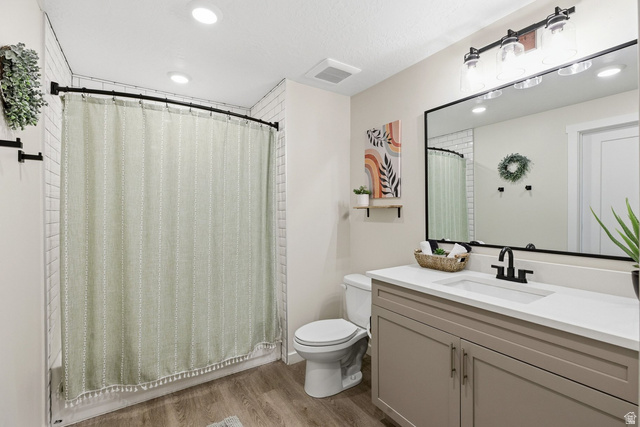 961 West Akoya Pearl Road, Unit 300 St. George, UT 84790 - Photo 38 of 60 Full bathroom with vanity, light wood-style floors, recessed lighting, and shower / tub combo with curtain