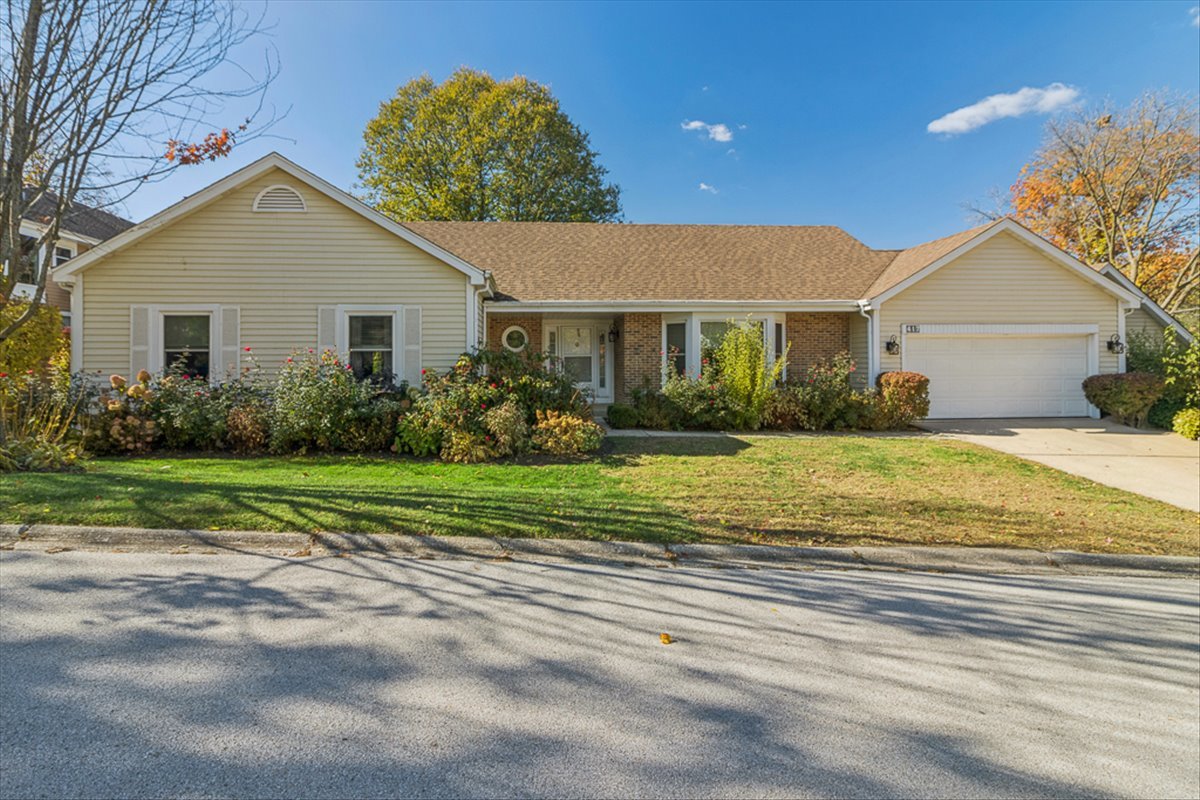 417 River Bluff Circle Naperville, IL 60540 - Photo 1 of 20 a front view of house with yard and green space
