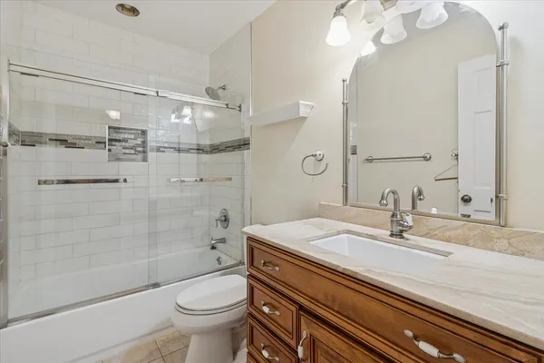 a view of an empty room with a windows