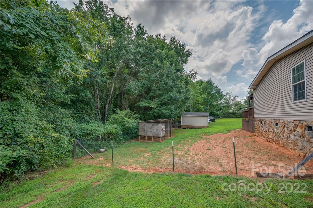2393 Pearidge Road Bostic, NC 28018 - Photo 13 of 39 a view of a backyard with furniture
