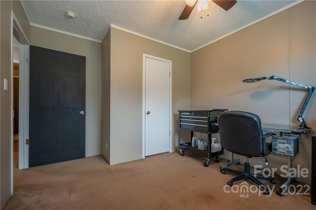 2393 Pearidge Road Bostic, NC 28018 - Photo 31 of 39 a view of a workspace with furniture and a window
