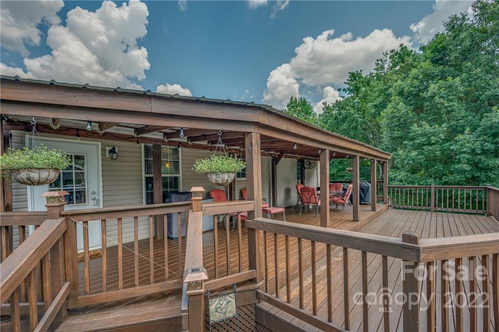 2393 Pearidge Road Bostic, NC 28018 - Photo 8 of 39 a view of a chair and tables in the balcony