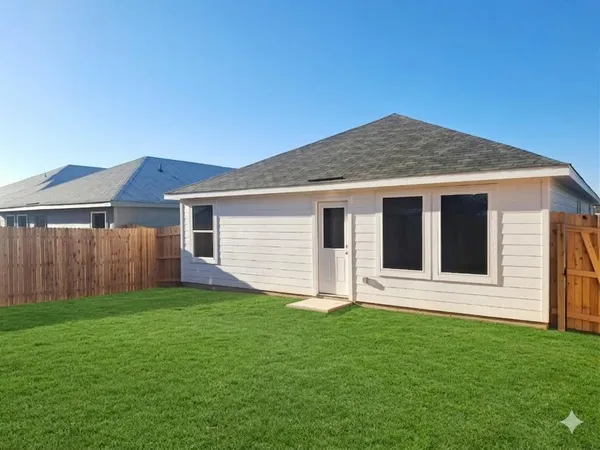 a bathroom with a sink toilet and a mirror