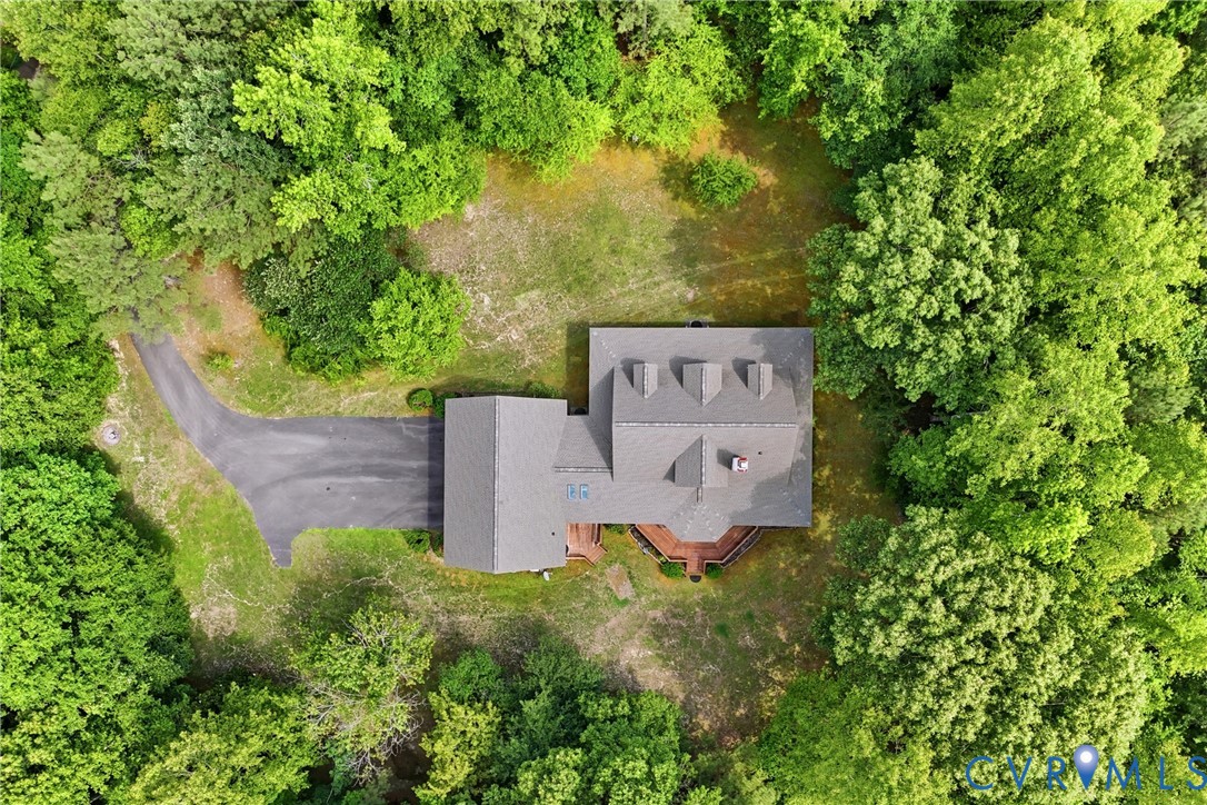 13265 Coulbourn Road Saluda, VA 23149 - Photo 56 of 62 House featuring a gray shingle roof with multiple