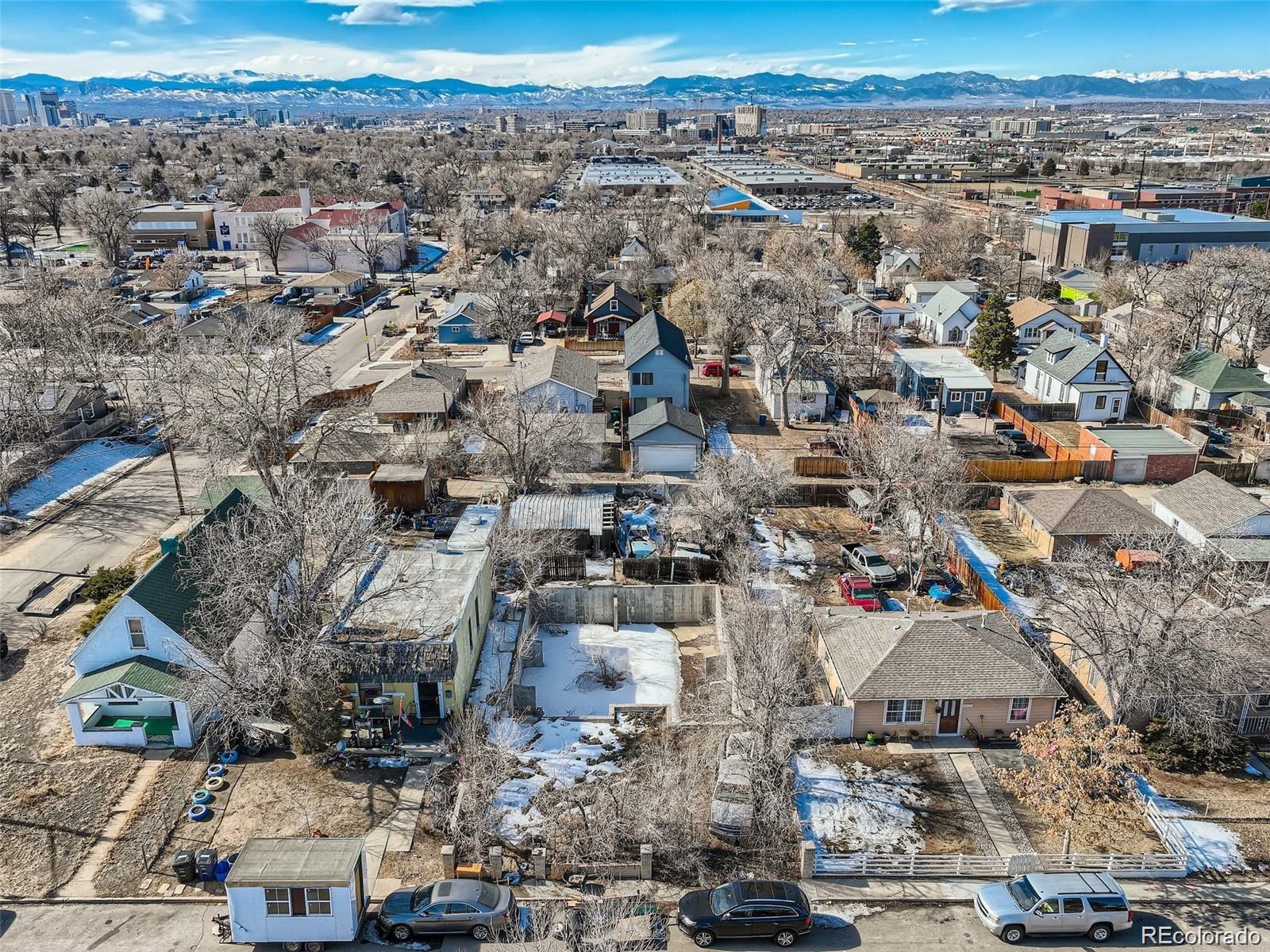 3815 Madison Street Denver, CO 80205 - Photo 2 of 7 an aerial view of a city