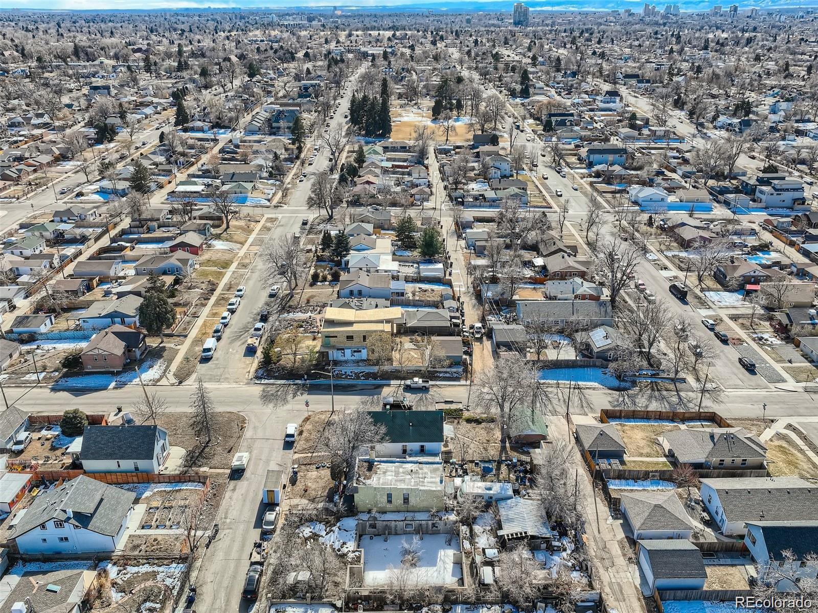 3815 Madison Street Denver, CO 80205 - Photo 4 of 7 an aerial view of a city