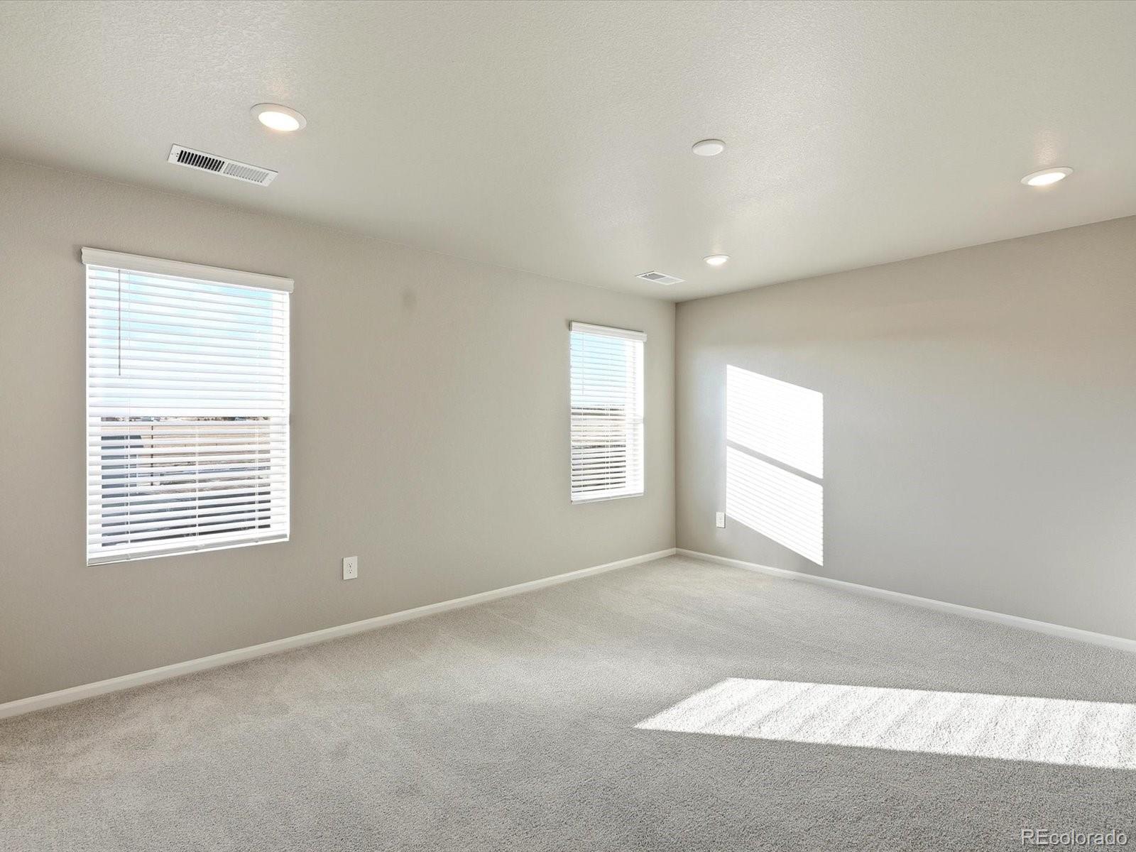 7317 West 27th St Road Greeley, CO 80634 - Photo 22 of 28 a view of an empty room with a window
