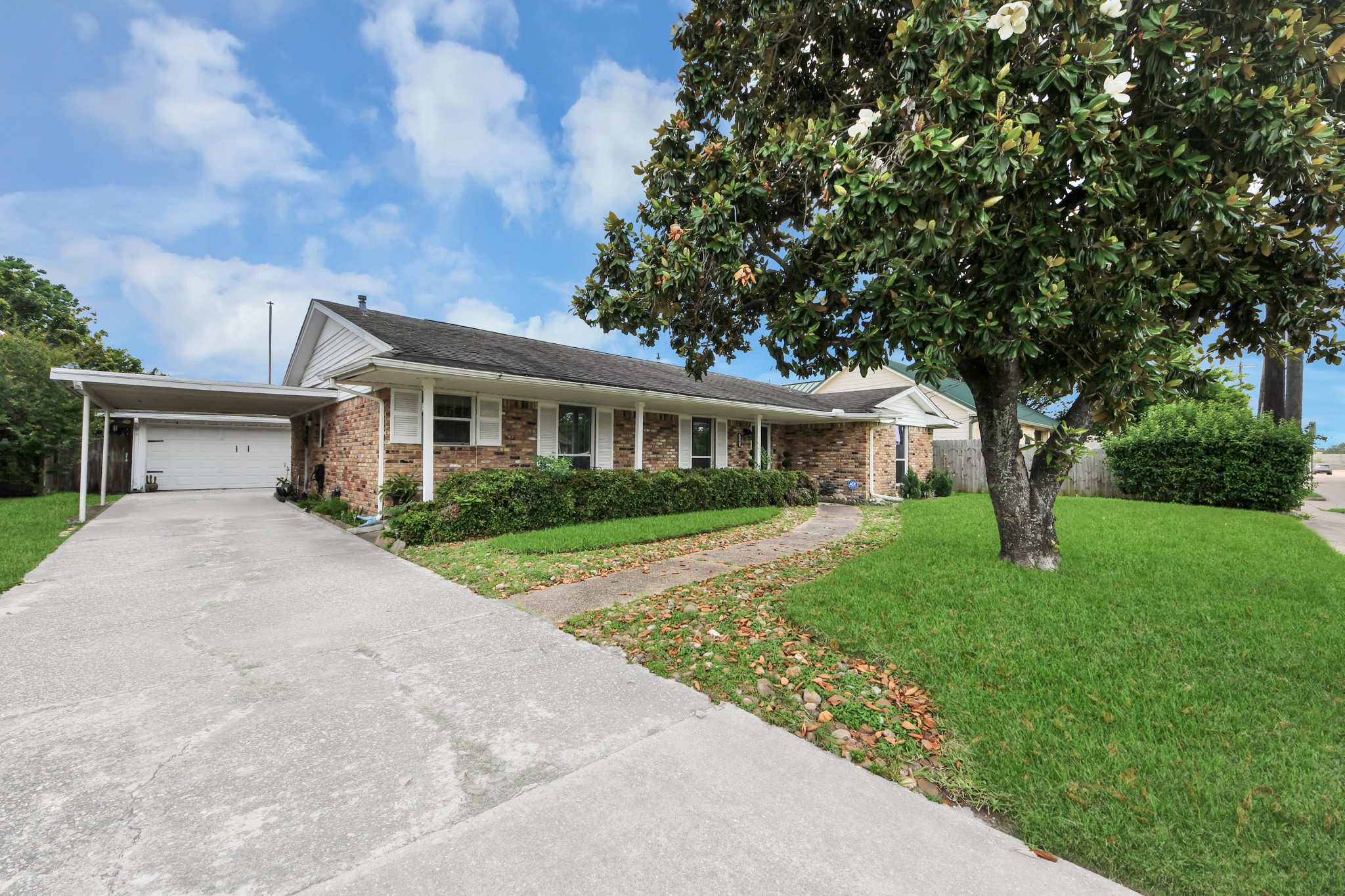 3901 Jeanetta Street Houston, TX 77063 - Photo 2 of 41 Extra parking space on this long driveway with two car garage and carport!