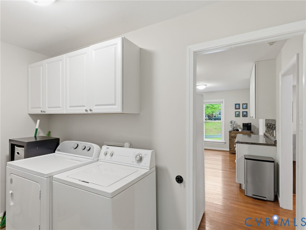 7707 Woodbrook Road Quinton, VA 23141 - Photo 34 of 42 Laundry area featuring white cabinetry with shaker