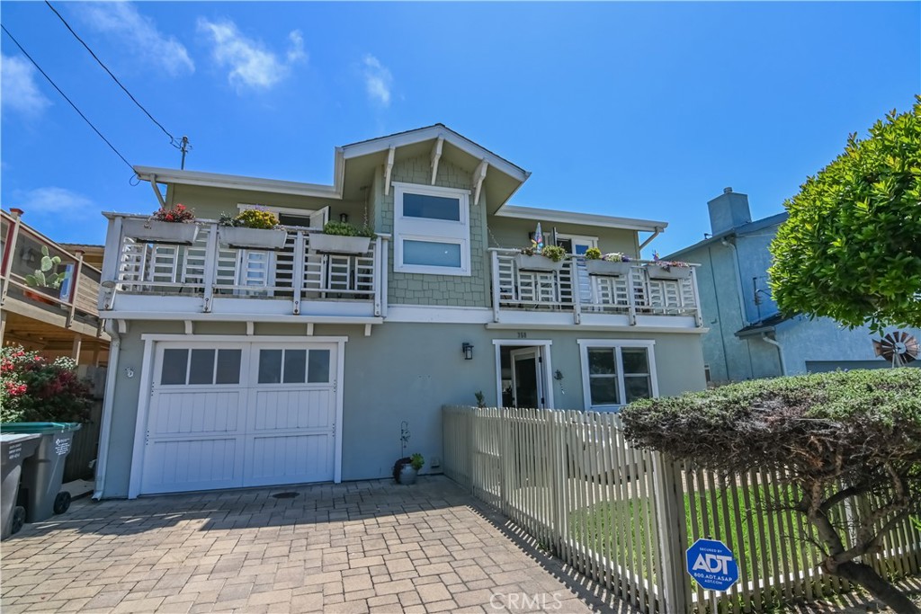 350 Java Street Morro Bay, CA 93442 - Photo 1 of 26 a front view of a house with parking
