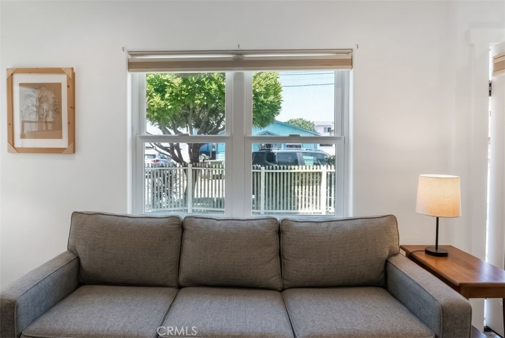 350 Java Street Morro Bay, CA 93442 - Photo 22 of 26 a living room with furniture and a window