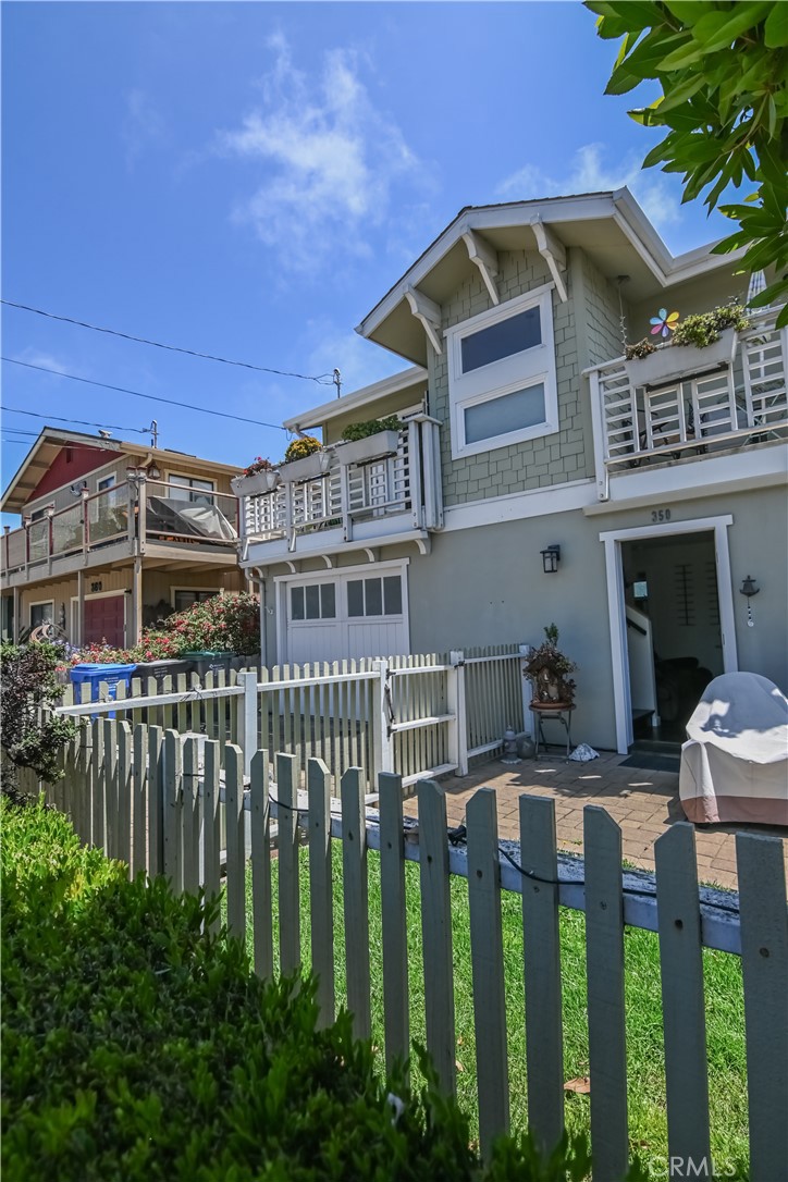 350 Java Street Morro Bay, CA 93442 - Photo 9 of 26 a front view of a house with a yard