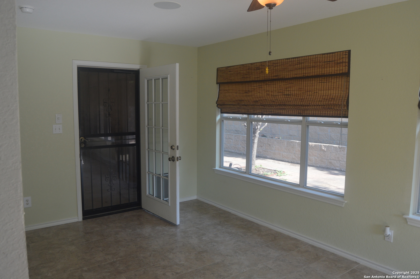 14847 Lytle Somerset Street Lytle, TX 78052 - Photo 12 of 42 a view of empty room with window and bathroom