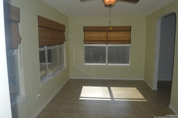 a kitchen that has a sink and a stove in it