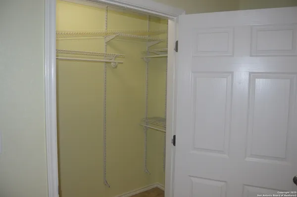 a bathroom with a shower and a toilet