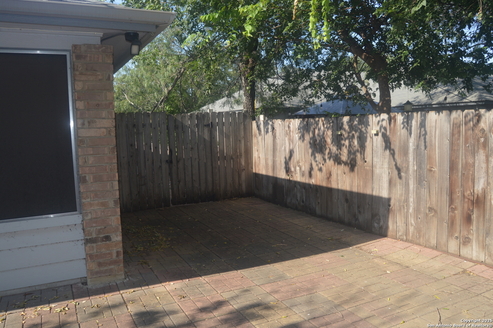 14847 Lytle Somerset Street Lytle, TX 78052 - Photo 36 of 42 a view of balcony with wooden floor and fence