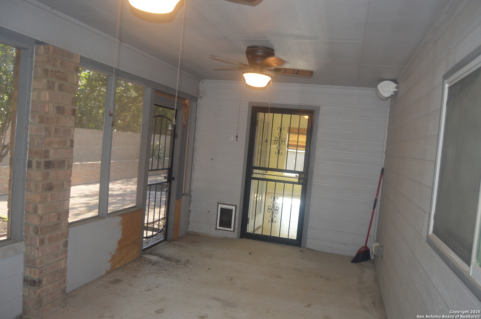 14847 Lytle Somerset Street Lytle, TX 78052 - Photo 10 of 42 a view of empty room with floor to ceiling window