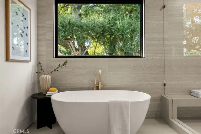 a utility room with sink dryer and washer
