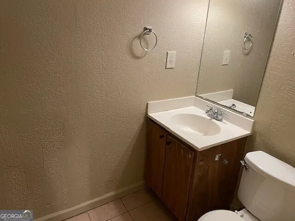 a bathroom with a sink and a toilet