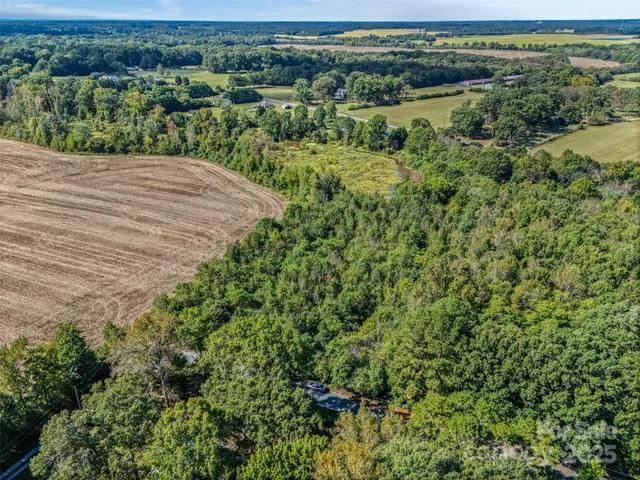 a view of a garden with a building
