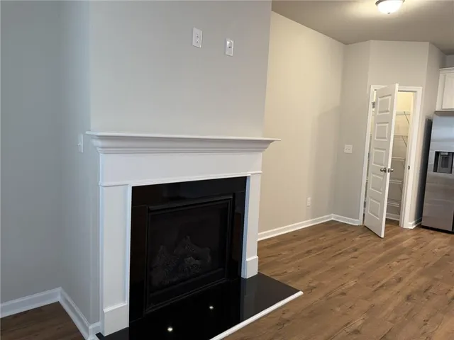 a living room with a fireplace