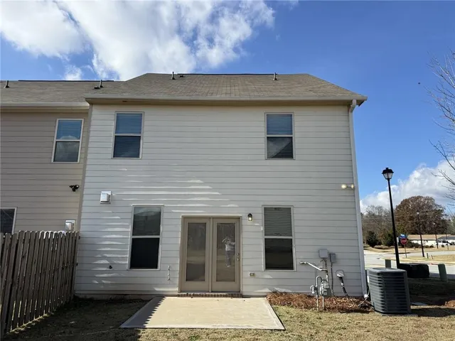 a view of a house with many windows