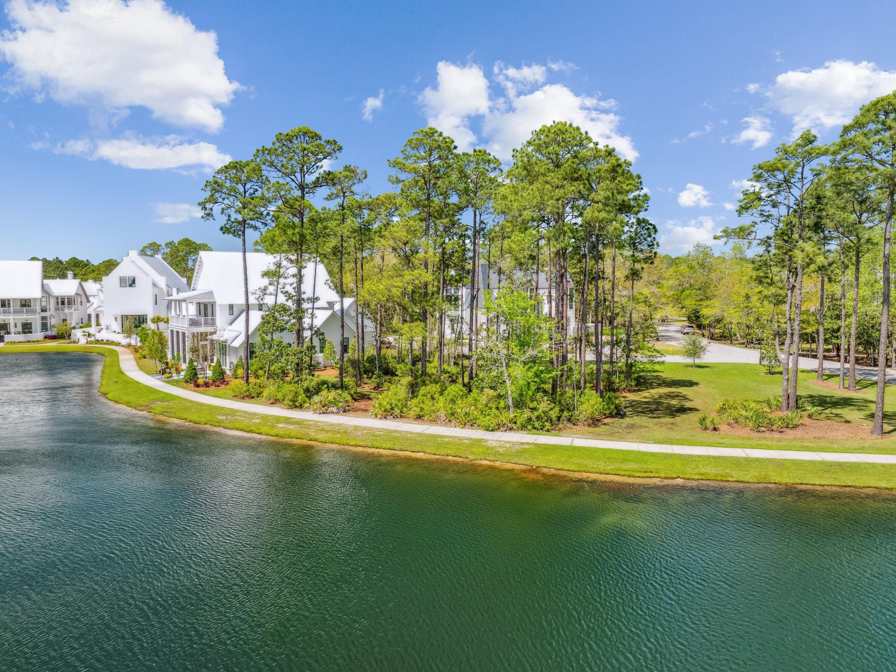 Lot 48 Perrin Santa Rosa Beach Santa Rosa Beach, FL 32459 - Photo 11 of 17 a view of a swimming pool with an outdoor space and seating area