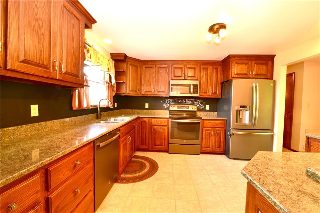 202 Malone Ridge Road Washington, PA 15301 - Photo 11 of 22 Kitchen recently installed with beautiful Cabinets and soft closures Quarts Counter tops All Stainless Steel Appliances included