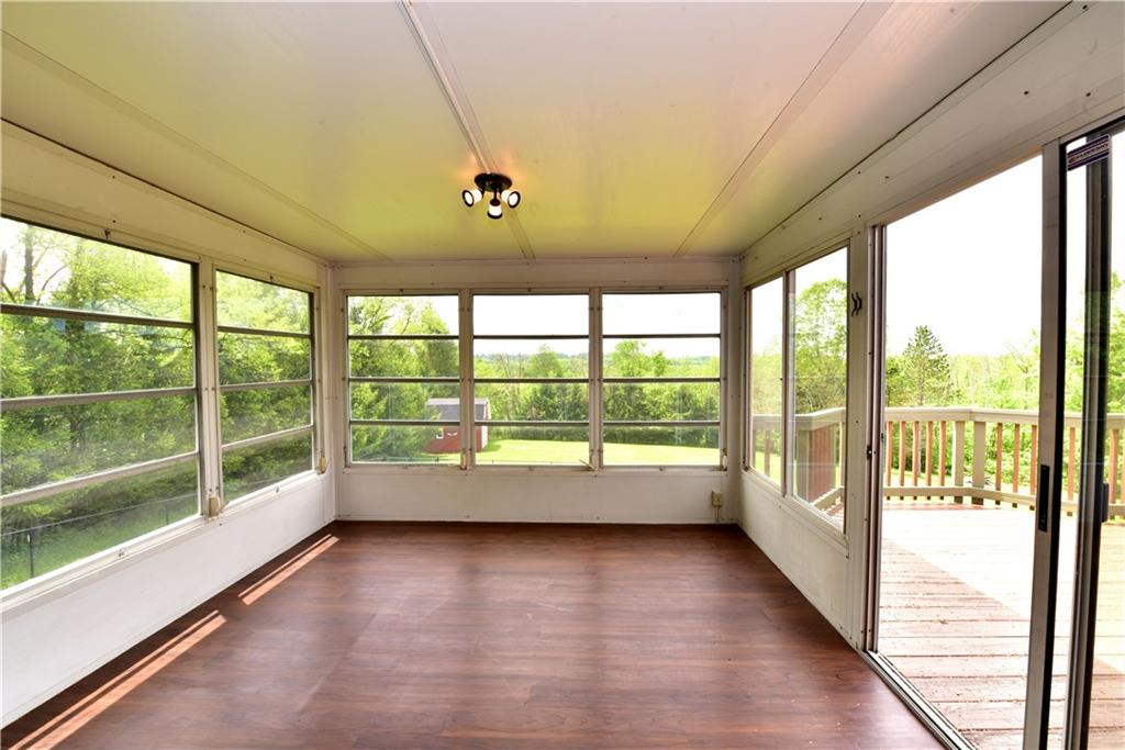 202 Malone Ridge Road Washington, PA 15301 - Photo 13 of 22 Sun Porch over looks the beautiful 1.2 Acres Very Private Opens onto the deck