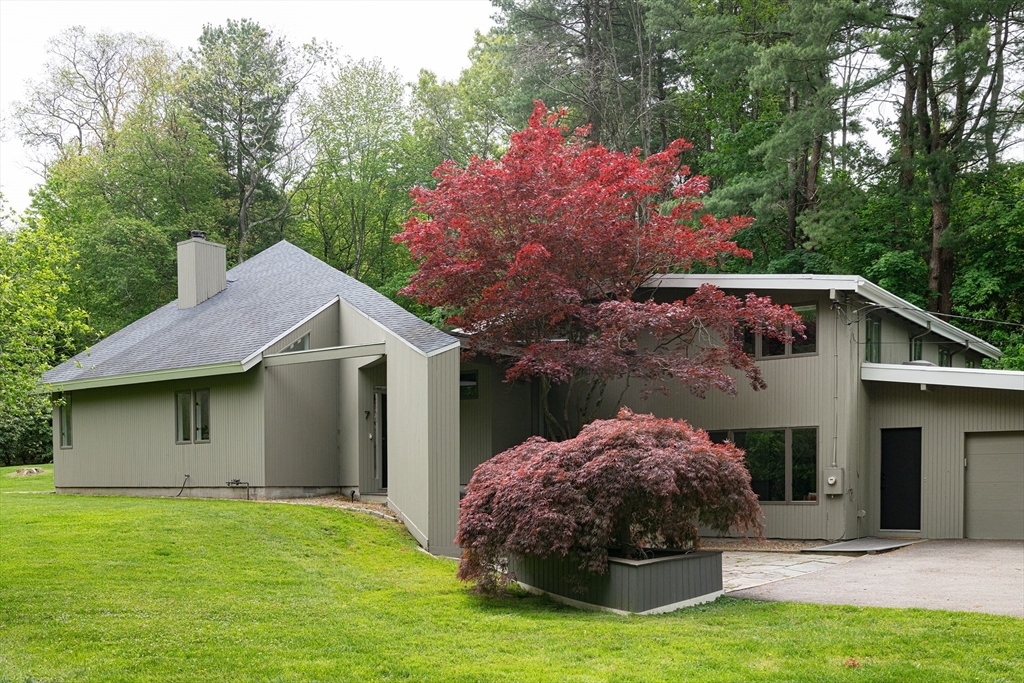 7 Diamond Road Lexington, MA 02420 - Photo 2 of 42 a front view of a house with garden