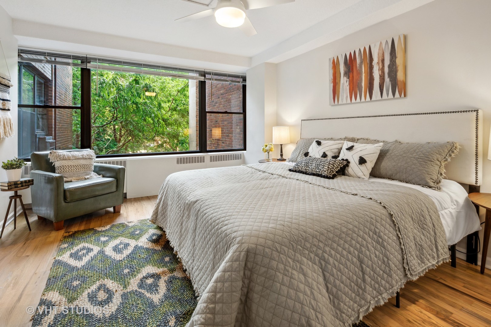 1540 North State Parkway, Unit 3D Chicago, IL 60610 - Photo 11 of 15 a bedroom with a bed and a large window