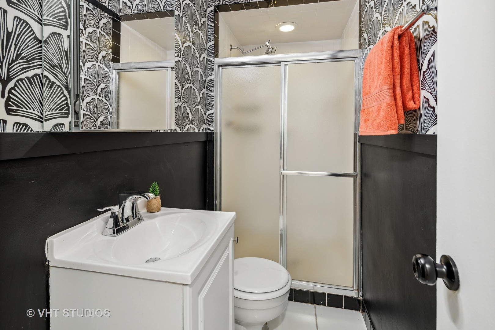 1540 North State Parkway, Unit 3D Chicago, IL 60610 - Photo 14 of 15 a bathroom with a sink a toilet and shower