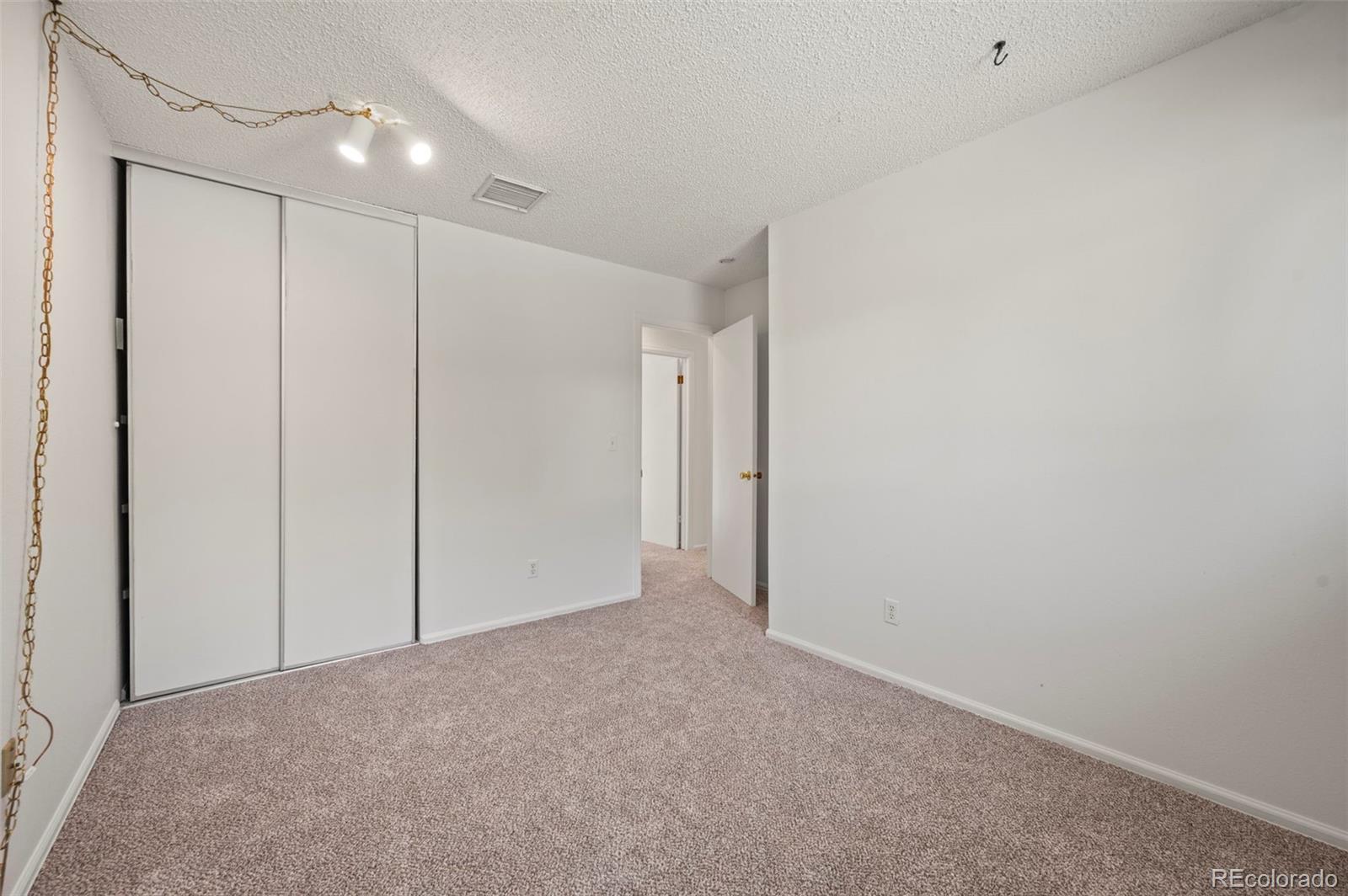 4420 South Vivian Way Morrison, CO 80465 - Photo 22 of 50 a view of an empty room