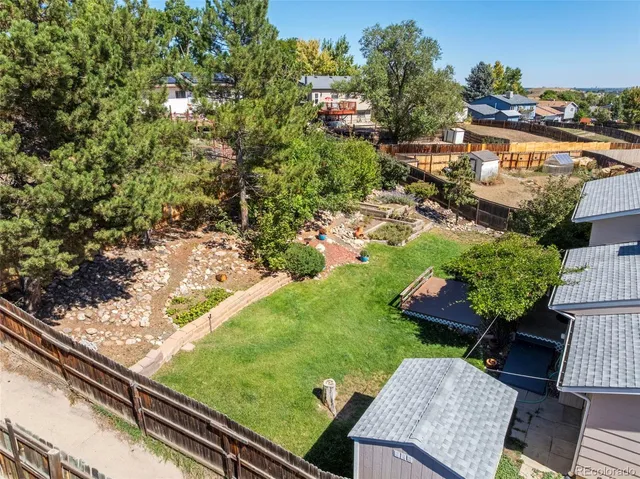 a view of a back yard of the house