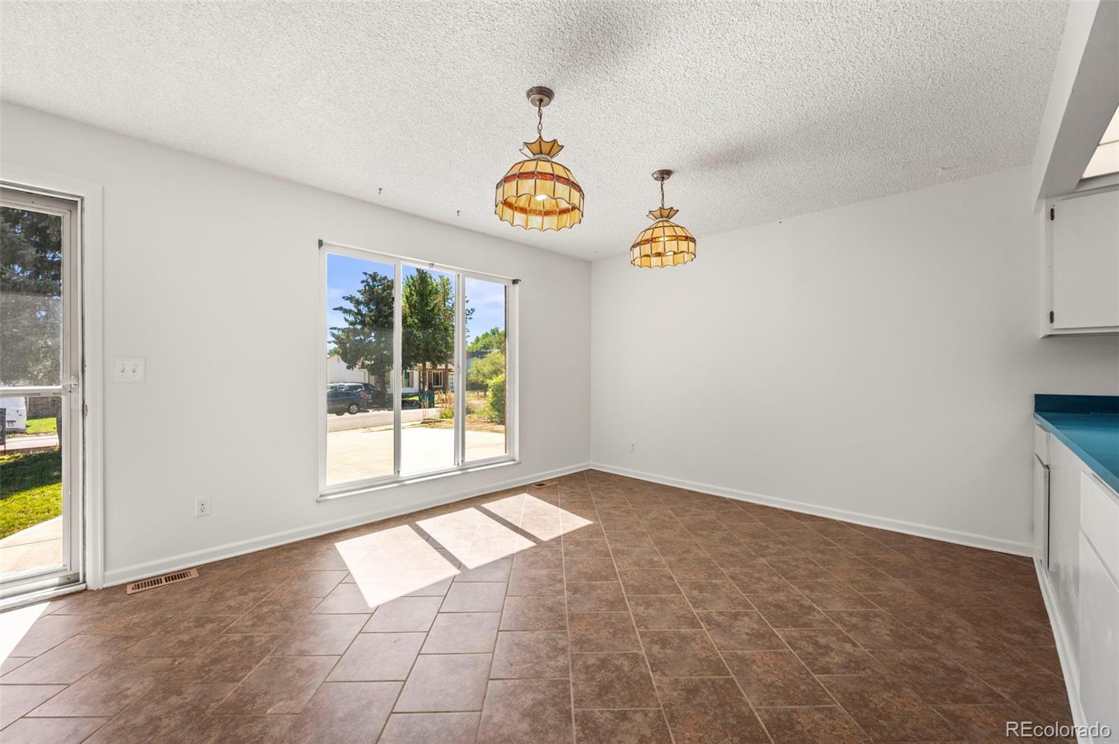 4420 South Vivian Way Morrison, CO 80465 - Photo 5 of 50 a view of an empty room with a window