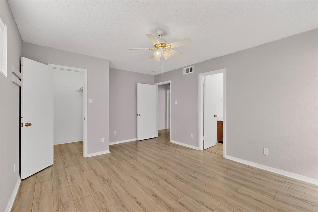 635 Haines Avenue Dallas, TX 75208 - Photo 25 of 36 a view of an empty room with wooden floor